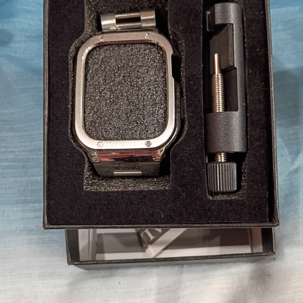 Apple Watch with Silver and Black Accessories